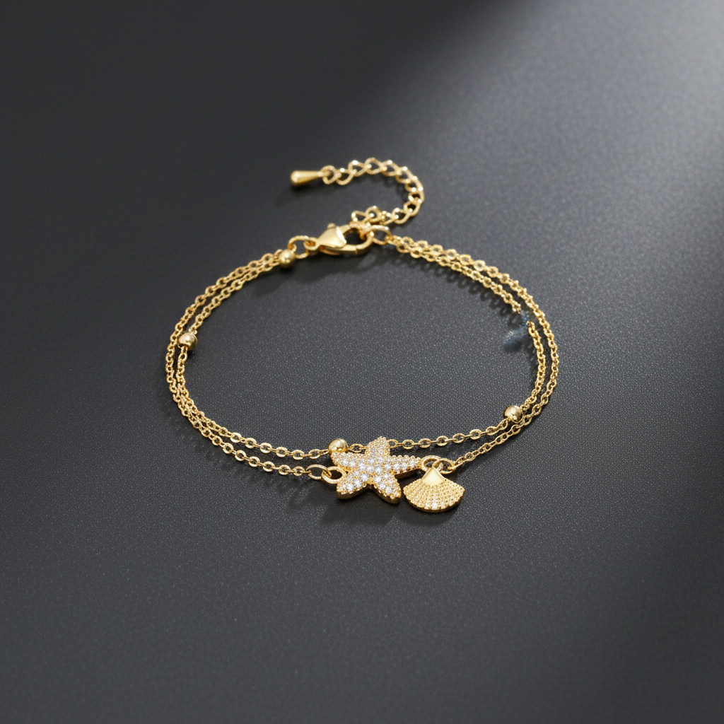 Ekrowl Marina-Shell: 18K Gold-Plated Pave Starfish & Fan-Shell Bracelet